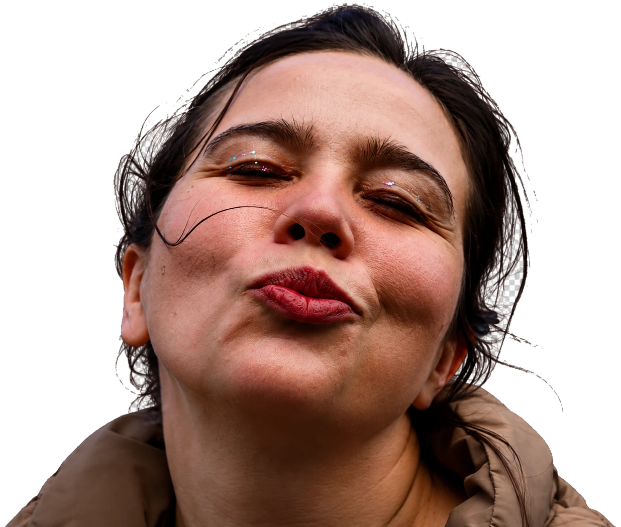 Jessikers making a kiss face in a low-angle close-up